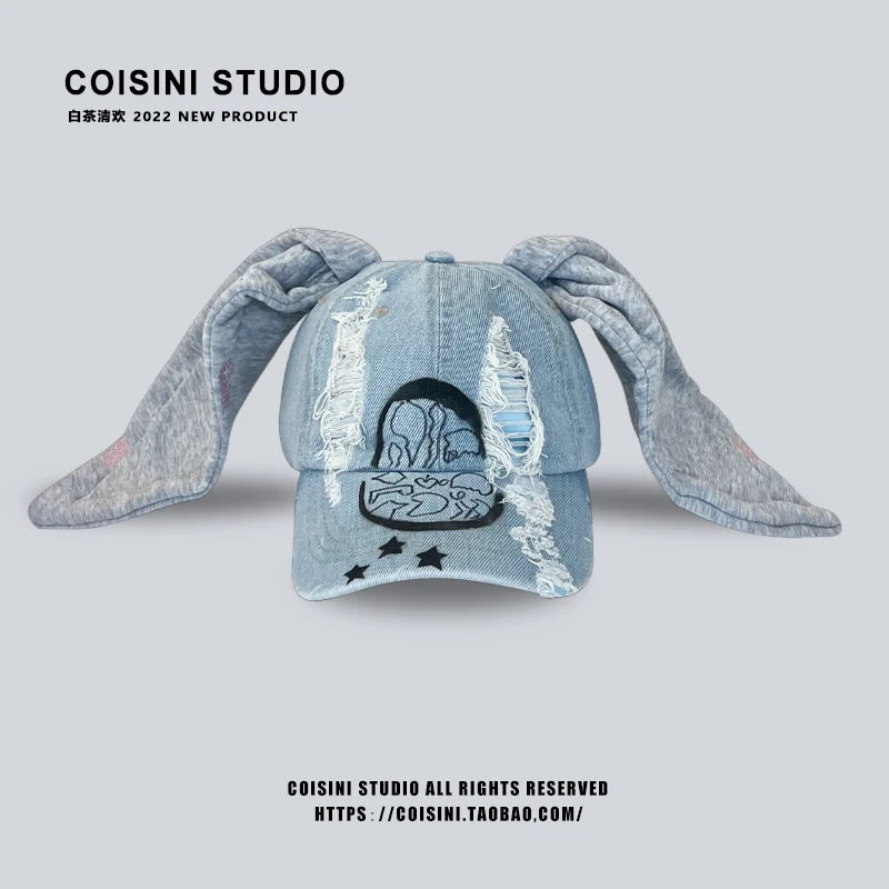 Niche Y2k Baseballkappe mit Hasenohren aus zerrissenem Denim für Damen und Herren, dunkles Design, Metallring, Street-Trend, verstellbare Sportkappe