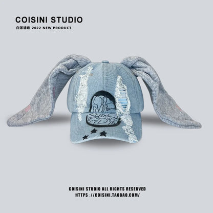Niche Y2k Baseballkappe mit Hasenohren aus zerrissenem Denim für Damen und Herren, dunkles Design, Metallring, Street-Trend, verstellbare Sportkappe