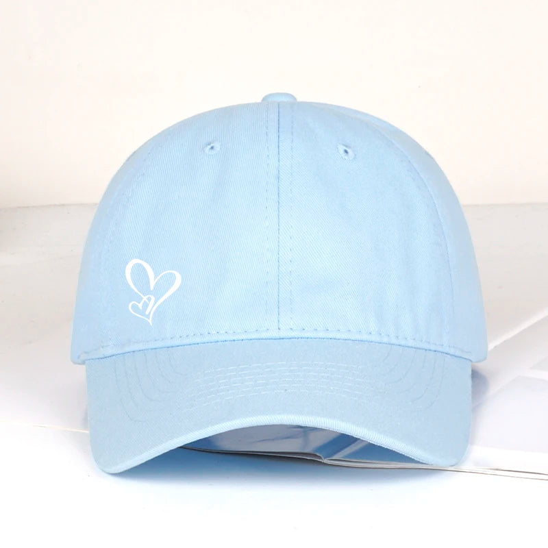 Casquette de baseball minimaliste à imprimé double cœur, pour femme et homme, souple et ajustable, style « dad hat », décontractée, sur le thème de l'amour, casquette de soleil